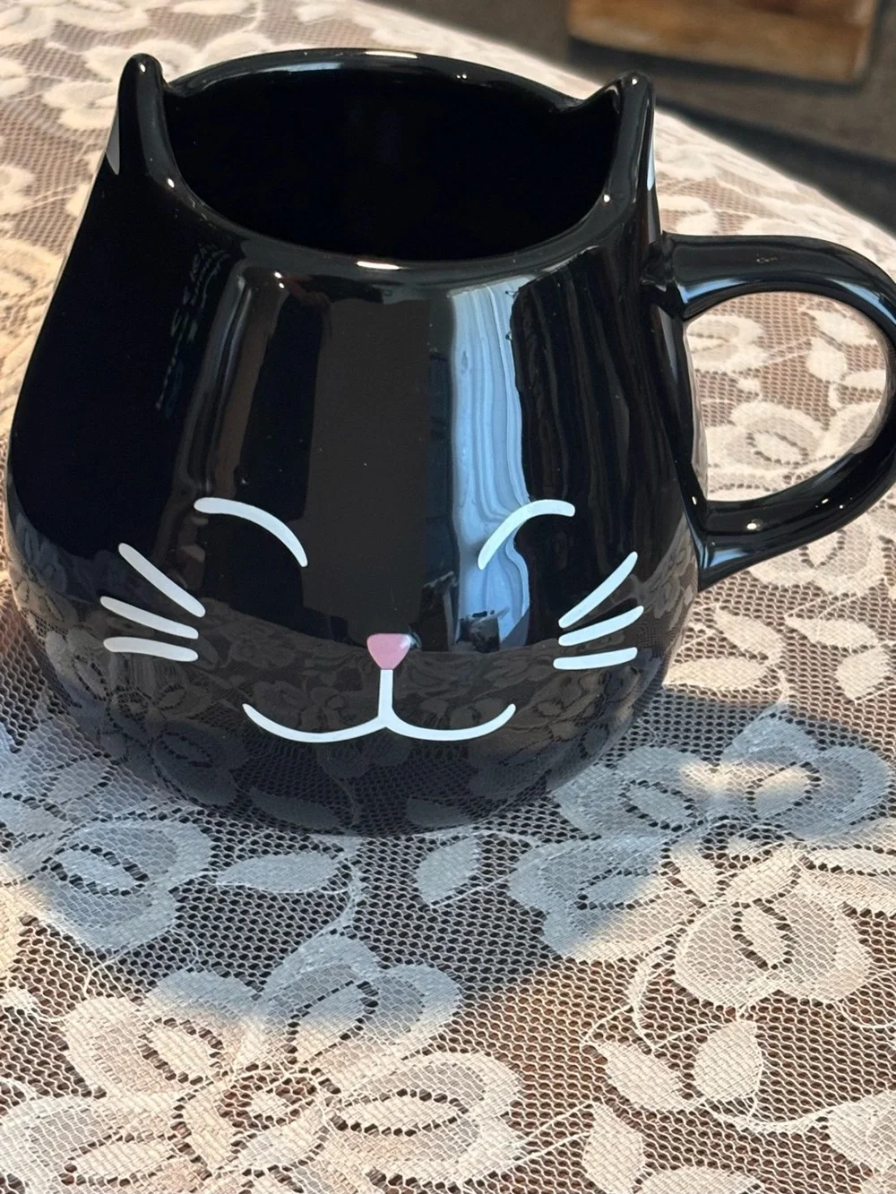 Very cute Ceramic Mug, Smiling Black Cat w Ears on Rim, Paw Print Inside.